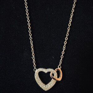 N121 - Silver Tone Open Heart Necklace with Rose Gold Accent Rhinestones 16"
